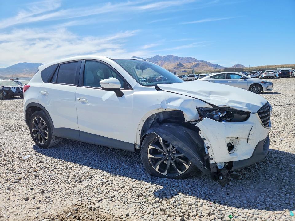 Photo 4 from auction – 2016 MAZDA CX-5 with VIN JM3KE2DY9G0690631