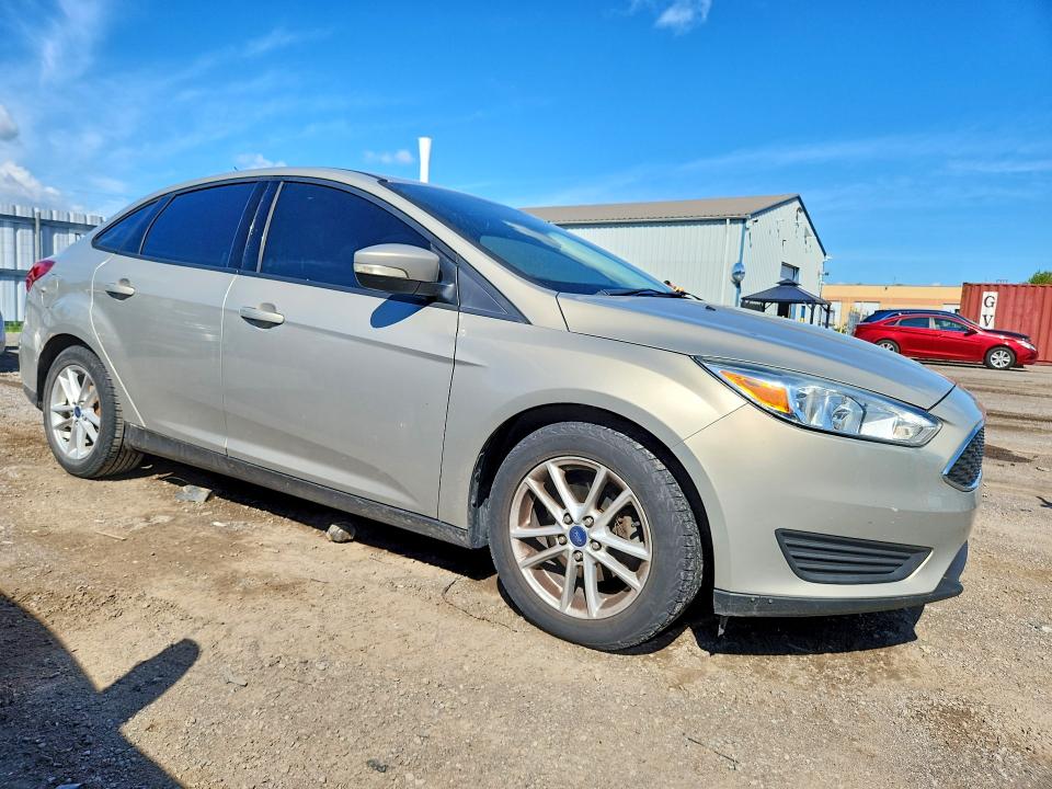 Photo 4 from auction – 2015 FORD FOCUS with VIN 1FADP3F2XFL320253