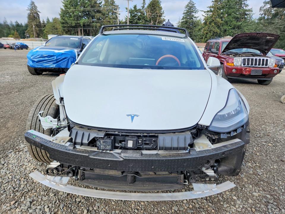 Photo 5 from auction – 2019 TESLA MODEL 3 with VIN 5YJ3E1EB2KF441325