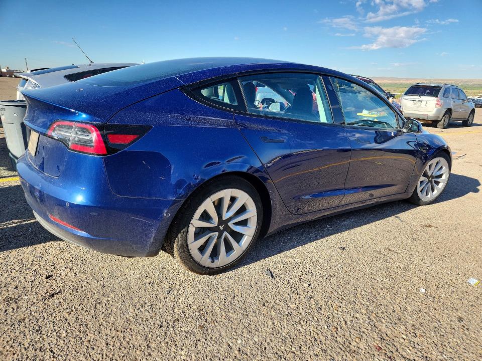 Photo 3 from auction – 2021 TESLA MODEL 3 with VIN 5YJ3E1EA5MF052852