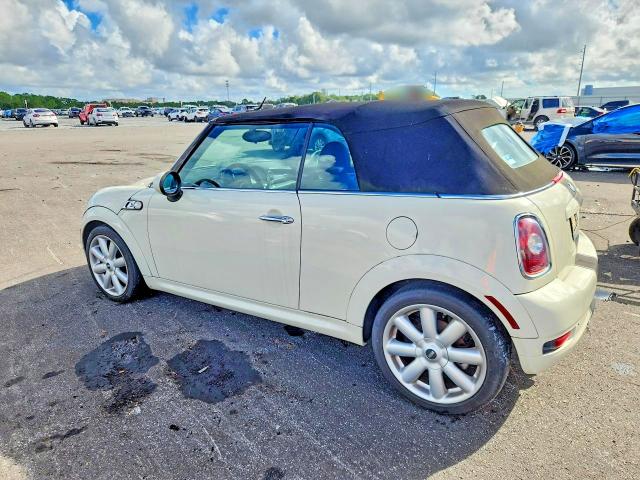 Photo 2 from auction – 2010 MINI COOPER with VIN WMWMS3C52ATY50651