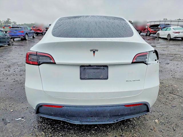 Снимка 6 от търг – 2023 TESLA MODEL Y с VIN 7SAYGDEE6PA093581