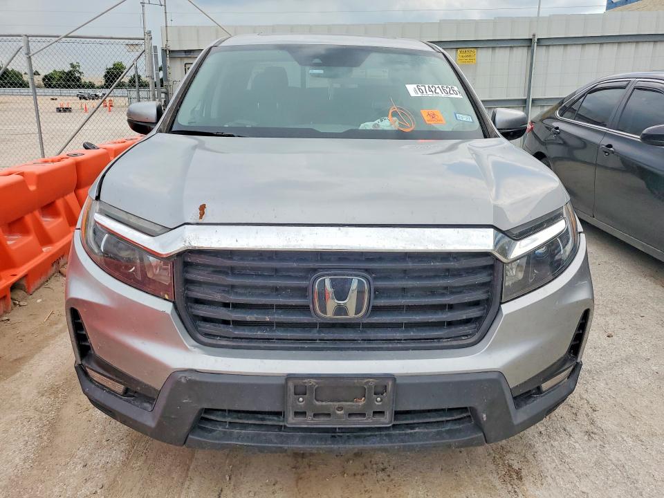 Photo 5 from auction – 2023 HONDA RIDGELINE with VIN 5FPYK3F58PB027466