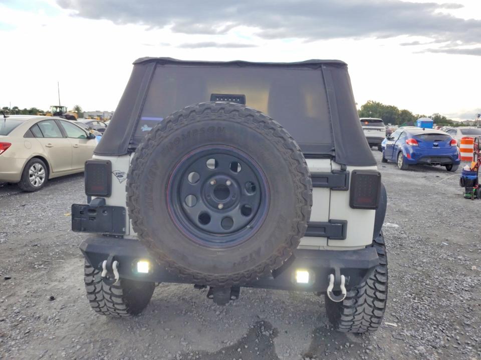 Photo 6 from auction – 2013 JEEP WRANGLER with VIN 1C4AJWAG0DL503581