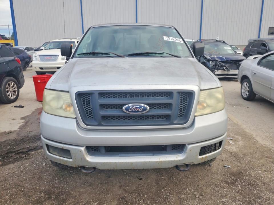 Photo 5 from auction – 2004 FORD F150 with VIN 1FTRX14W64NC12952