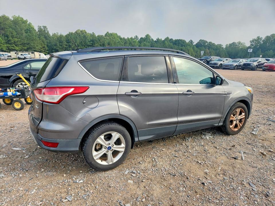 Photo 3 from auction – 2014 FORD ESCAPE with VIN 1FMCU9GX2EUD48189
