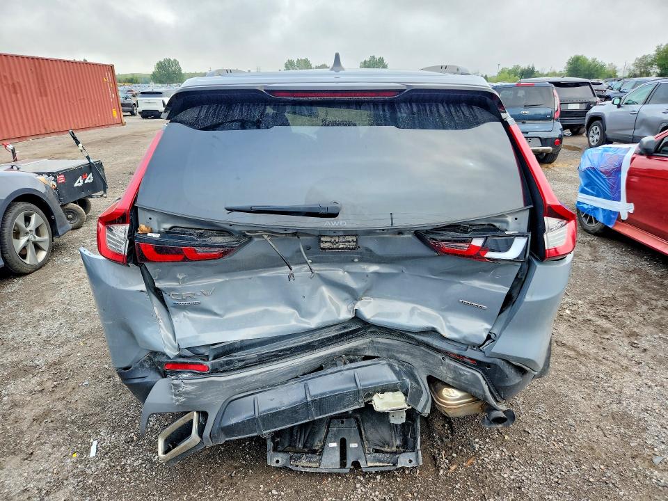 Photo 6 from auction – 2024 HONDA CR-V with VIN 2HKRS6H97RH203524