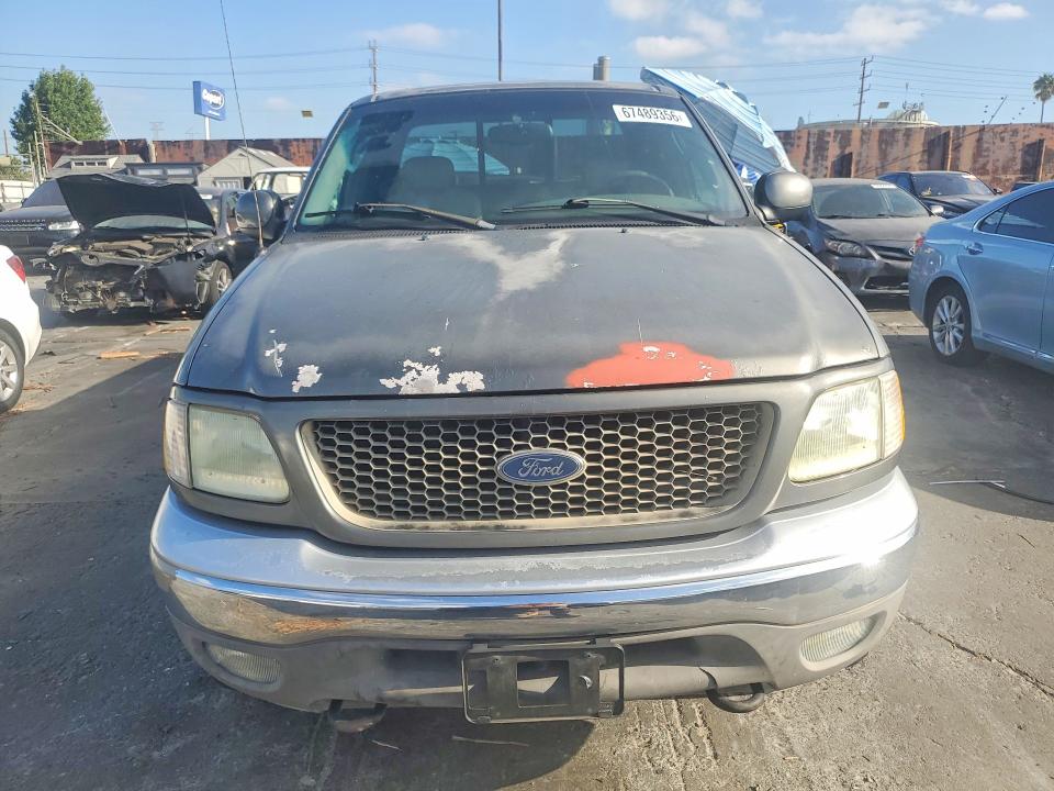 Photo 5 from auction – 2003 FORD F150 with VIN 1FTRX18L53NB87914