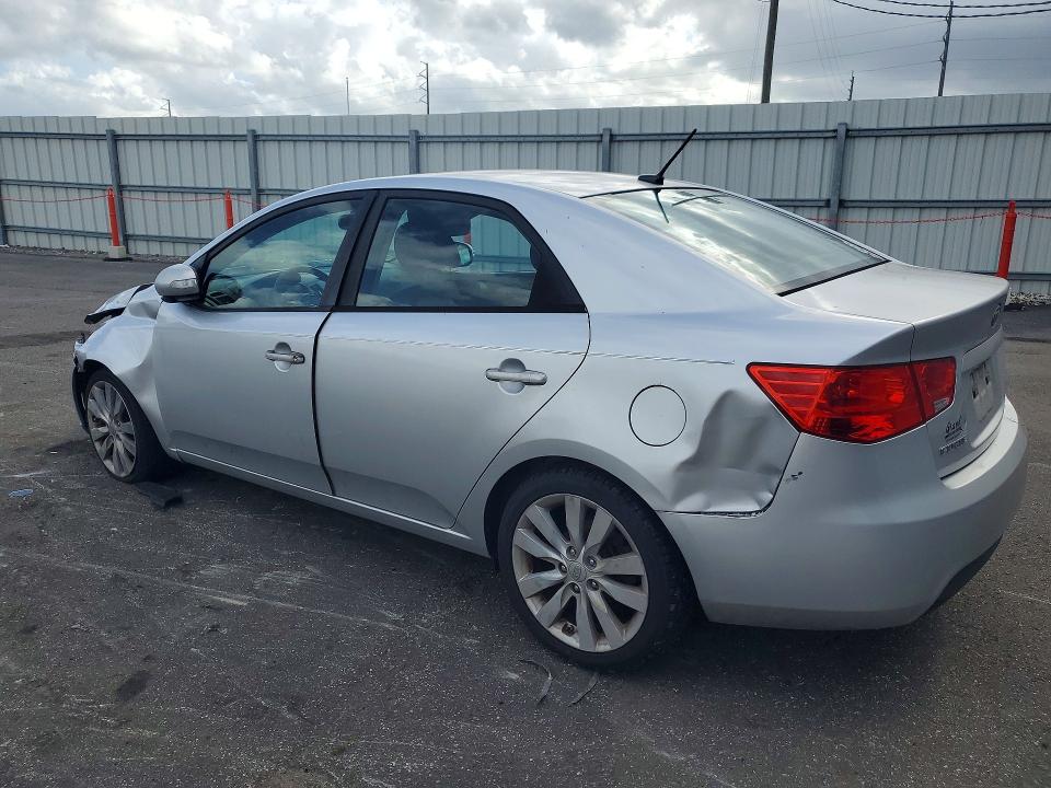 Photo 2 from auction – 2010 KIA FORTE with VIN KNAFW4A34A5310291