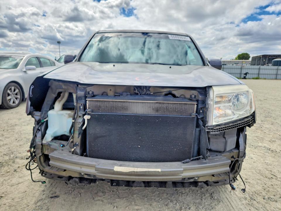 Photo 5 from auction – 2014 HONDA PILOT with VIN 5FNYF3H92EB020555
