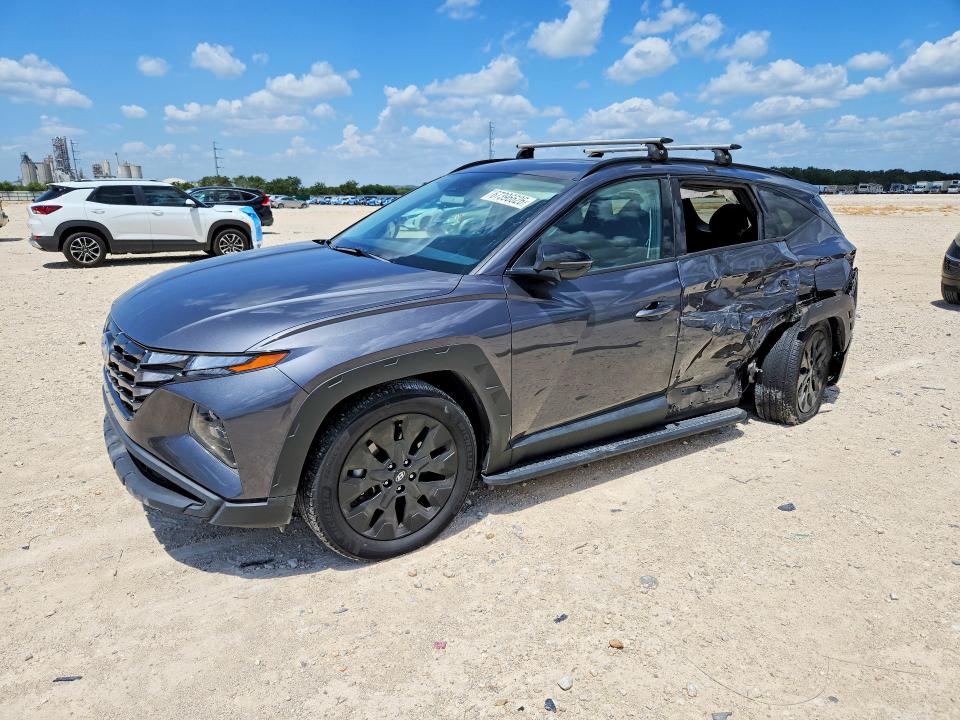 HYUNDAI TUCSON 2022 with VIN KM8JFCAE7NU164355 - Photo from auction