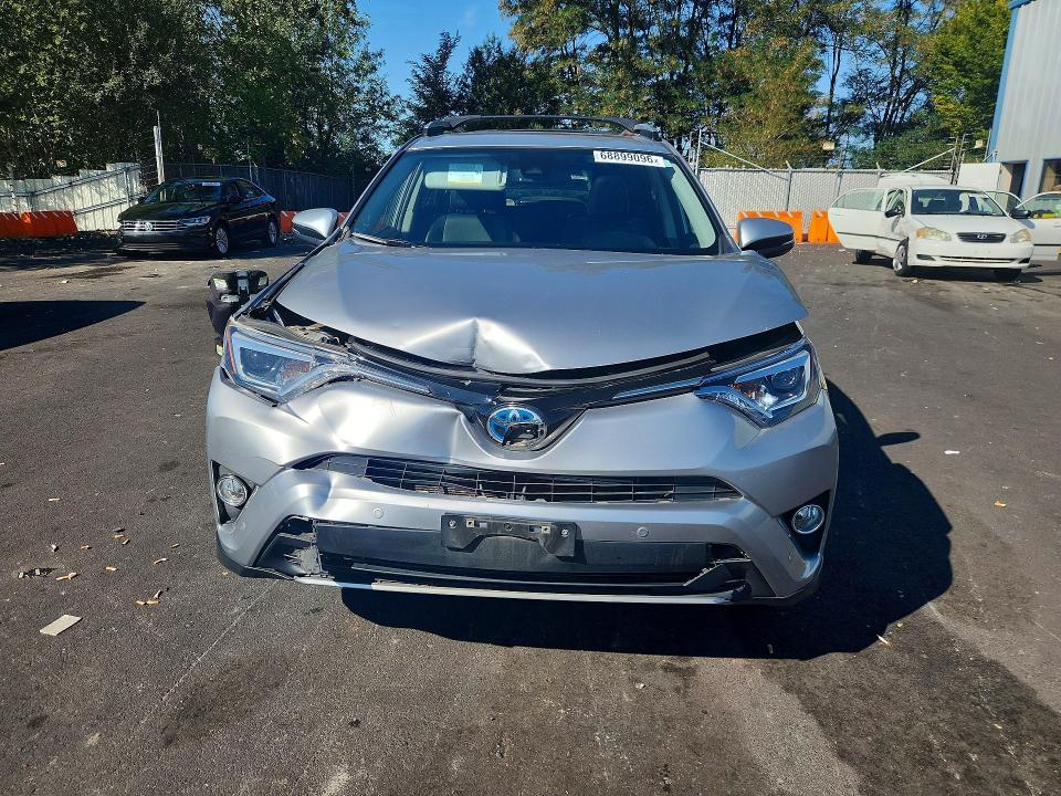 Photo 5 from auction – 2017 TOYOTA RAV4 HV with VIN JTMDJREV4HD083265