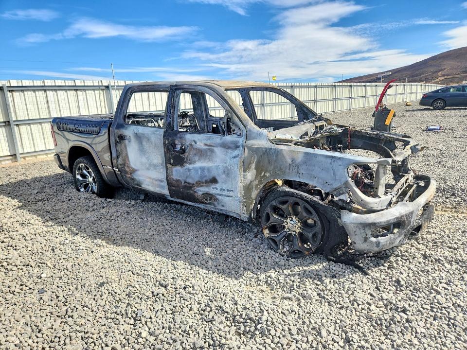 Photo 4 from auction – 2021 RAM 1500 with VIN 1C6SRFHM9MN565677