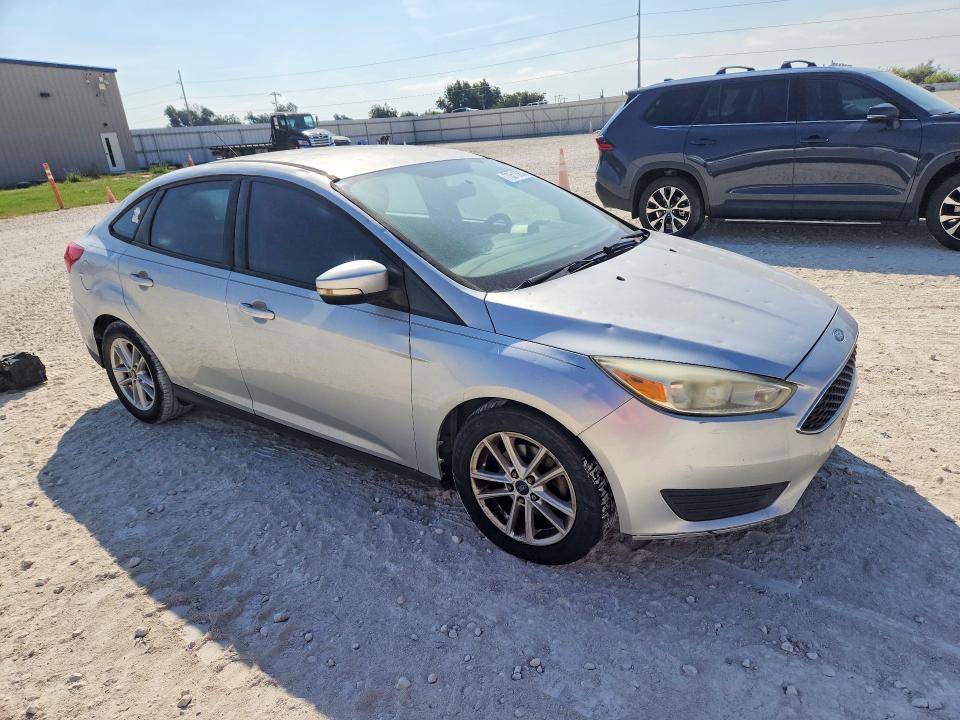 Photo 4 from auction – 2015 FORD FOCUS with VIN 1FADP3F29FL347797