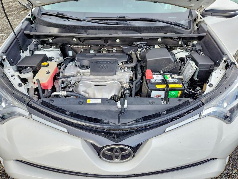 Photo 12 from auction – 2018 TOYOTA RAV4 with VIN 2T3RFREV3JW801050