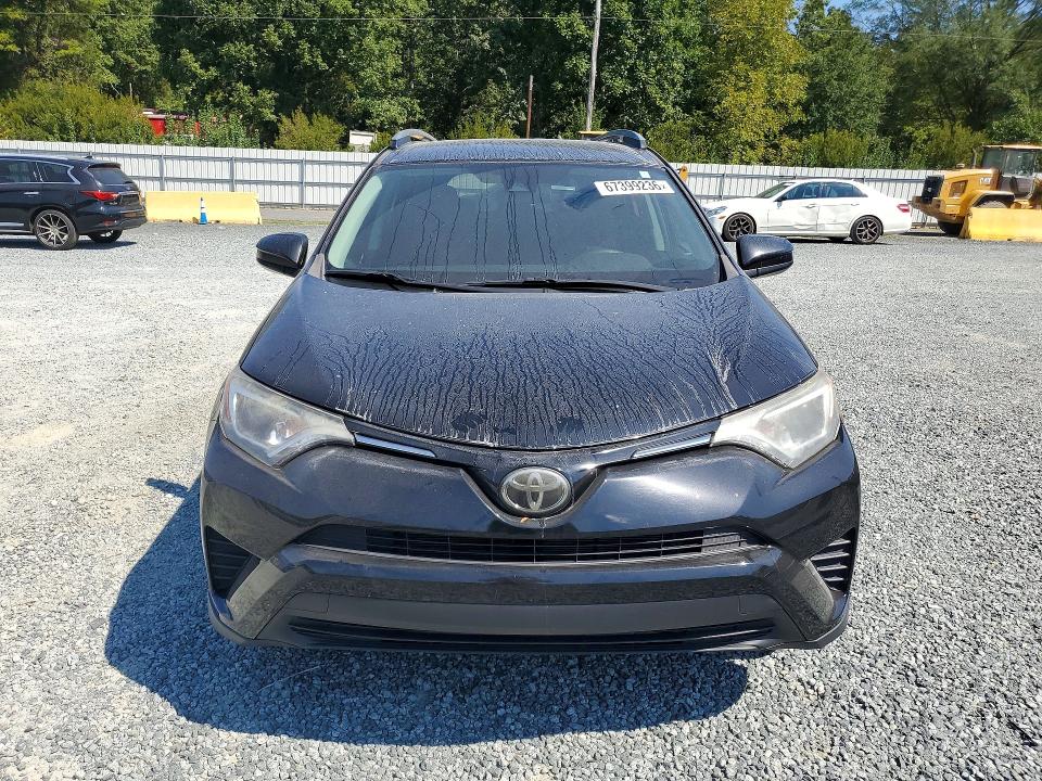 Photo 5 from auction – 2018 TOYOTA RAV4 with VIN 2T3ZFREV6JW480010