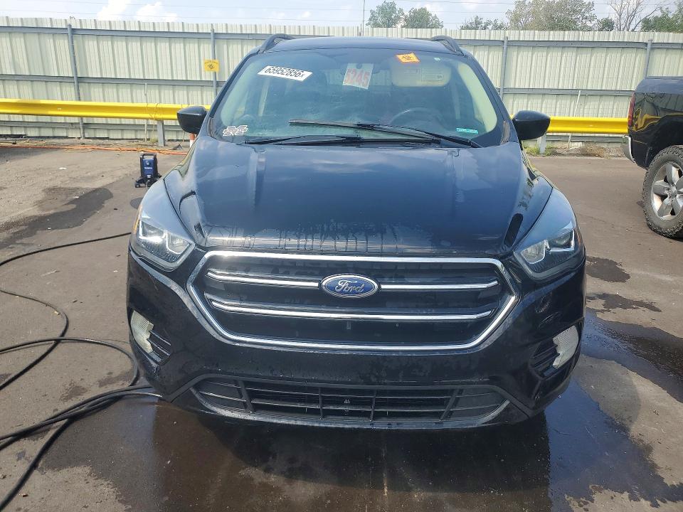 Photo 5 from auction – 2018 FORD ESCAPE with VIN 1FMCU9GD8JUD49072