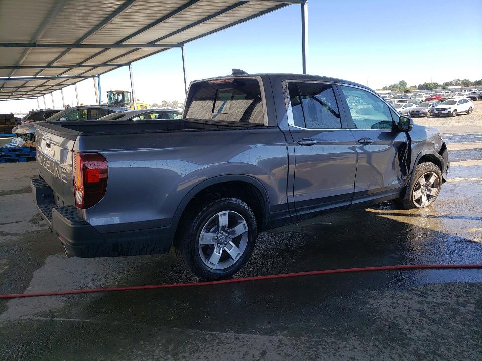 Photo 3 from auction – 2025 HONDA RIDGELINE with VIN 5FPYK3F57SB037611
