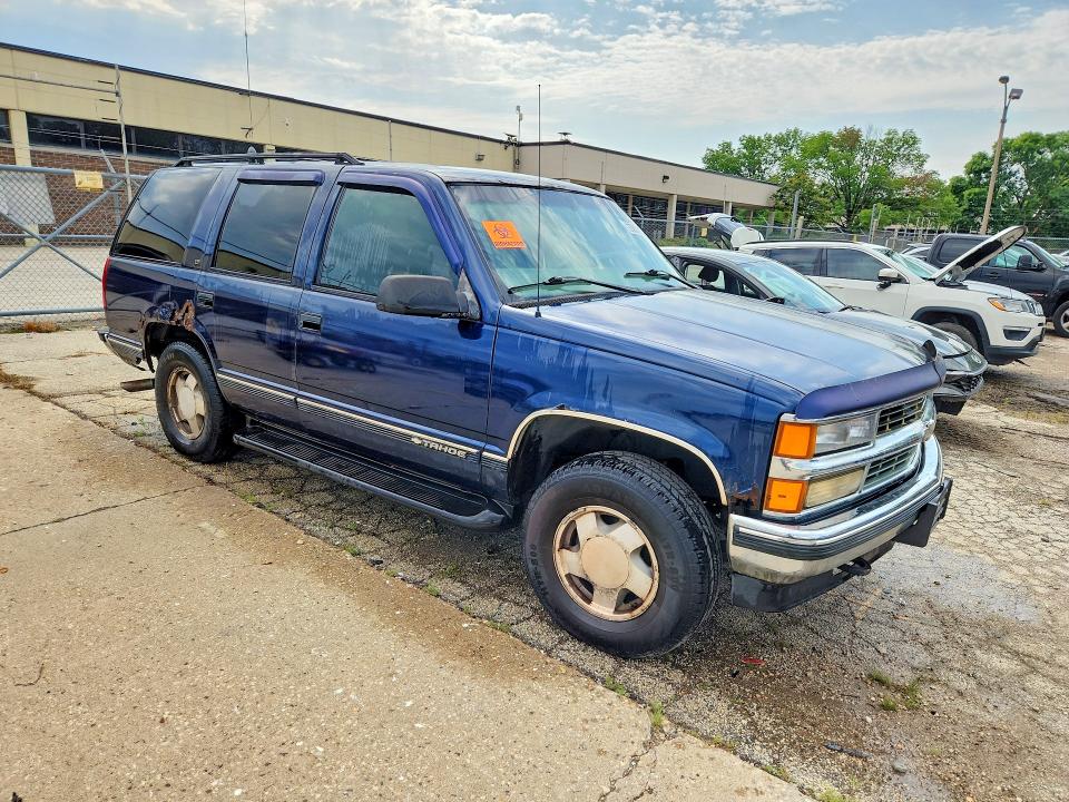 Снимка 4 от търг – 1999 CHEVROLET TAHOE с VIN 1GNEK13R9XJ322714