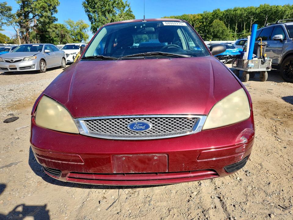 Photo 5 from auction – 2006 FORD FOCUS with VIN 1FAFP31N06W141552