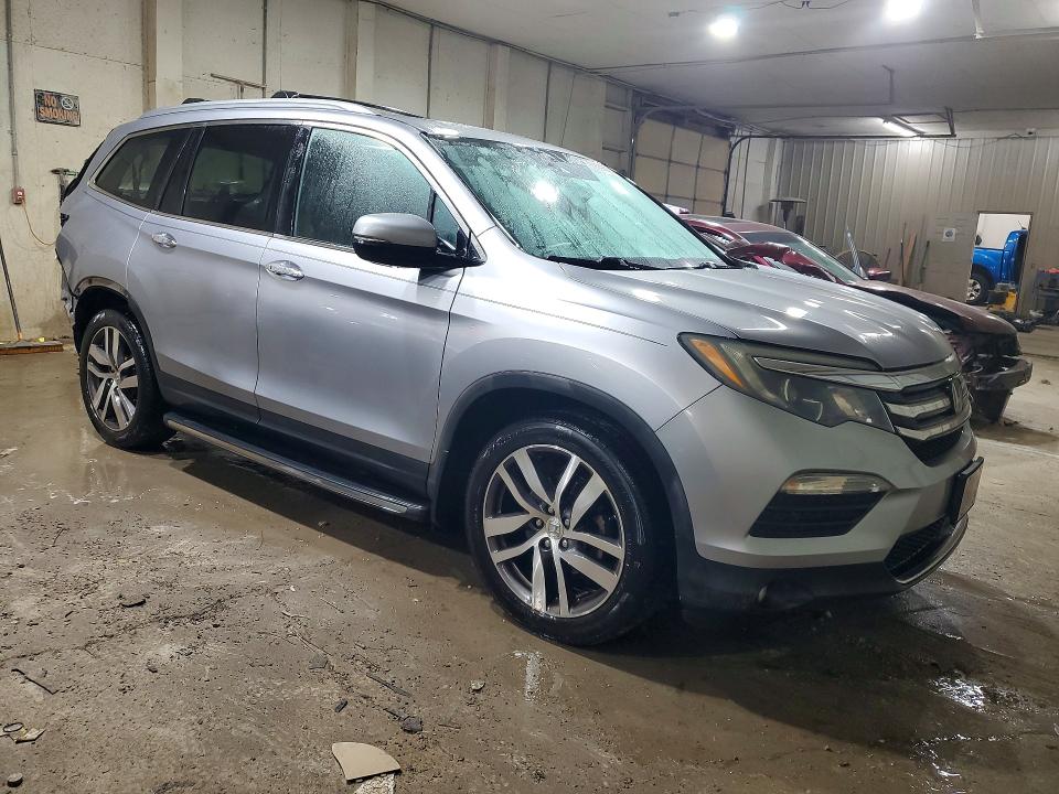 Снимка 4 от търг – 2016 HONDA PILOT с VIN 5FNYF6H07GB037387