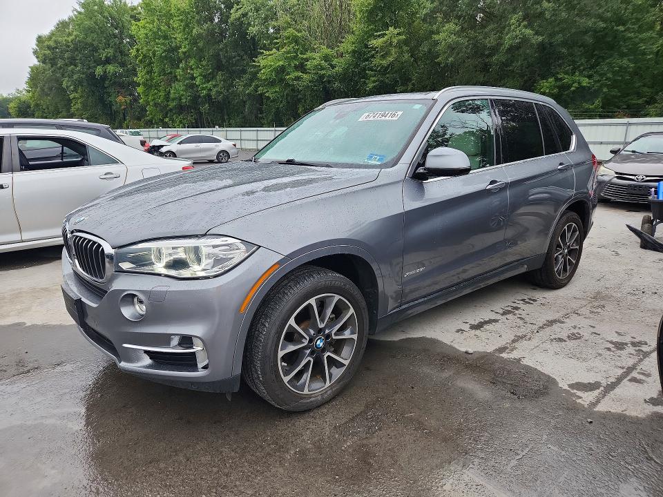 BMW X5 2017 with VIN 5UXKR0C51H0V67978 - Photo from auction