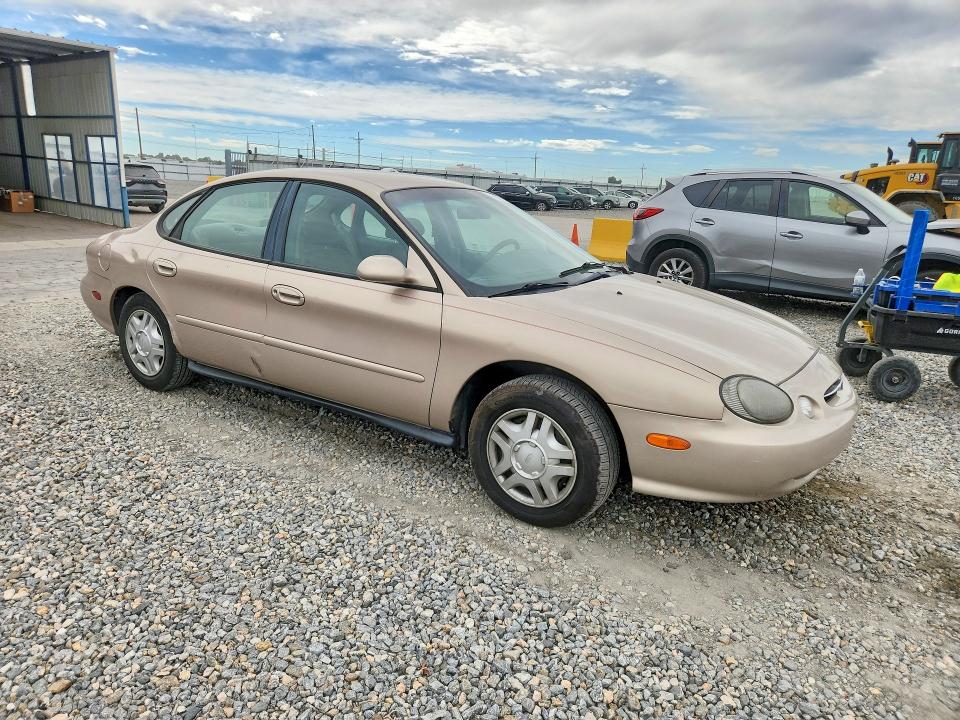 Photo 4 from auction – 1999 FORD TAURUS with VIN 1FAFP53U0XG129588