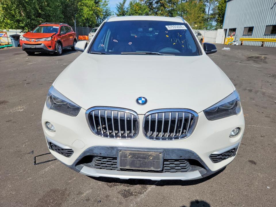 Foto 5 de la subasta – 2016 BMW X1 con VIN WBXHT3C32GP888675