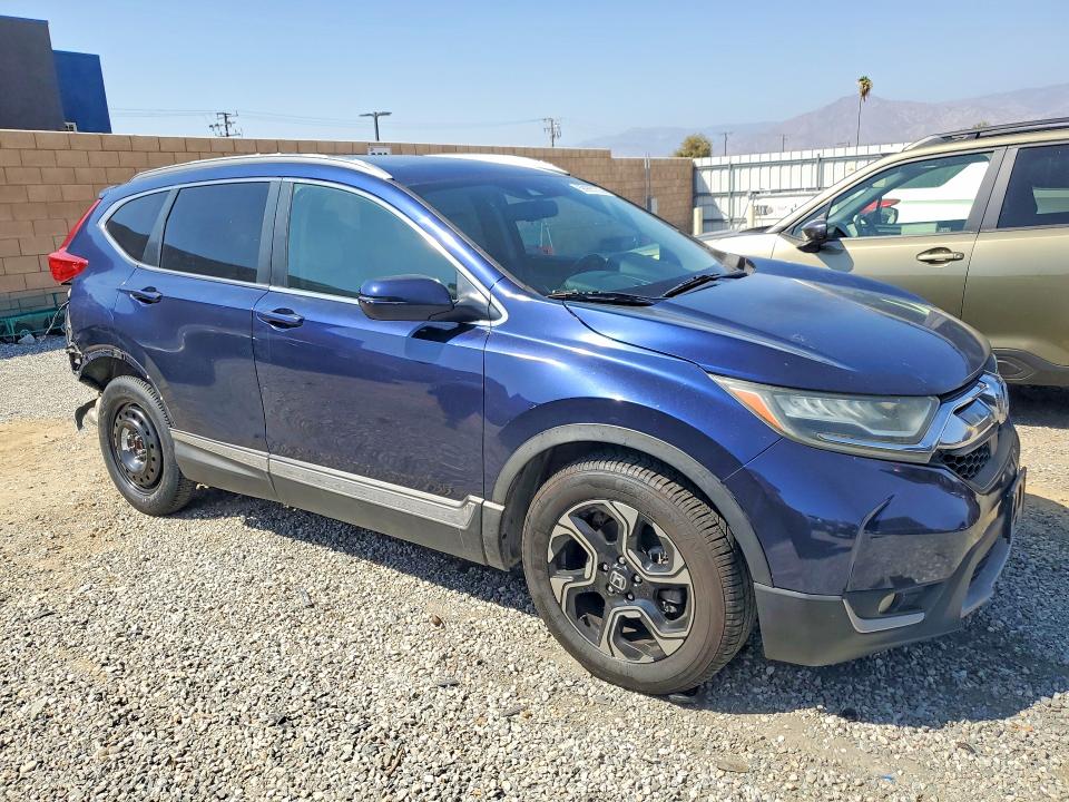 Photo 4 from auction – 2017 HONDA CR-V with VIN 2HKRW1H90HH506618
