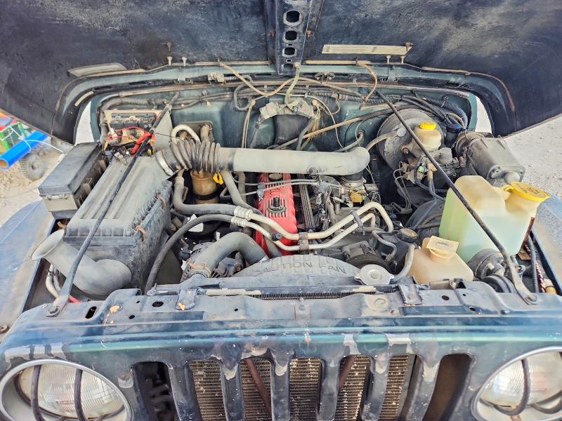 Photo 11 from auction – 2000 JEEP WRANGLER with VIN 1J4FA59S8YP728946