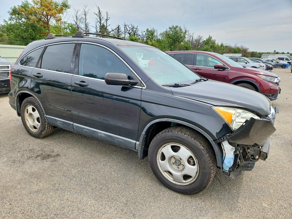 Photo 4 from auction – 2009 HONDA CR-V with VIN 5J6RE38359L033705