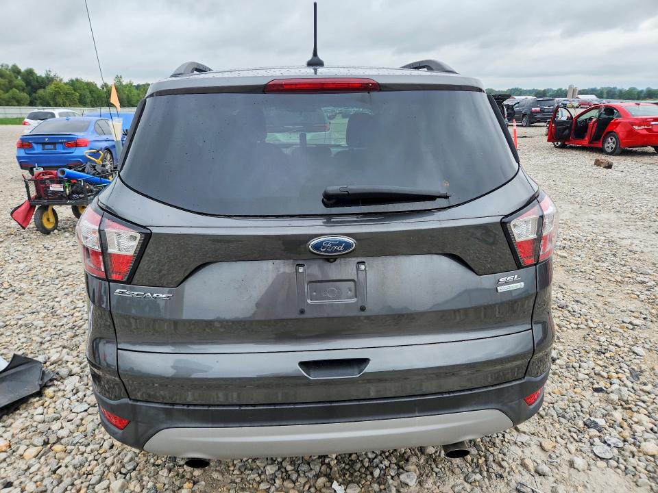 Photo 6 from auction – 2018 FORD ESCAPE with VIN 1FMCU0HD3JUB20812