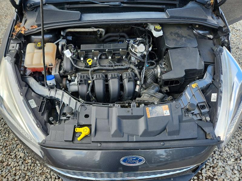 Foto 11 de la subasta – 2017 FORD FOCUS con VIN 1FADP3E27HL319257