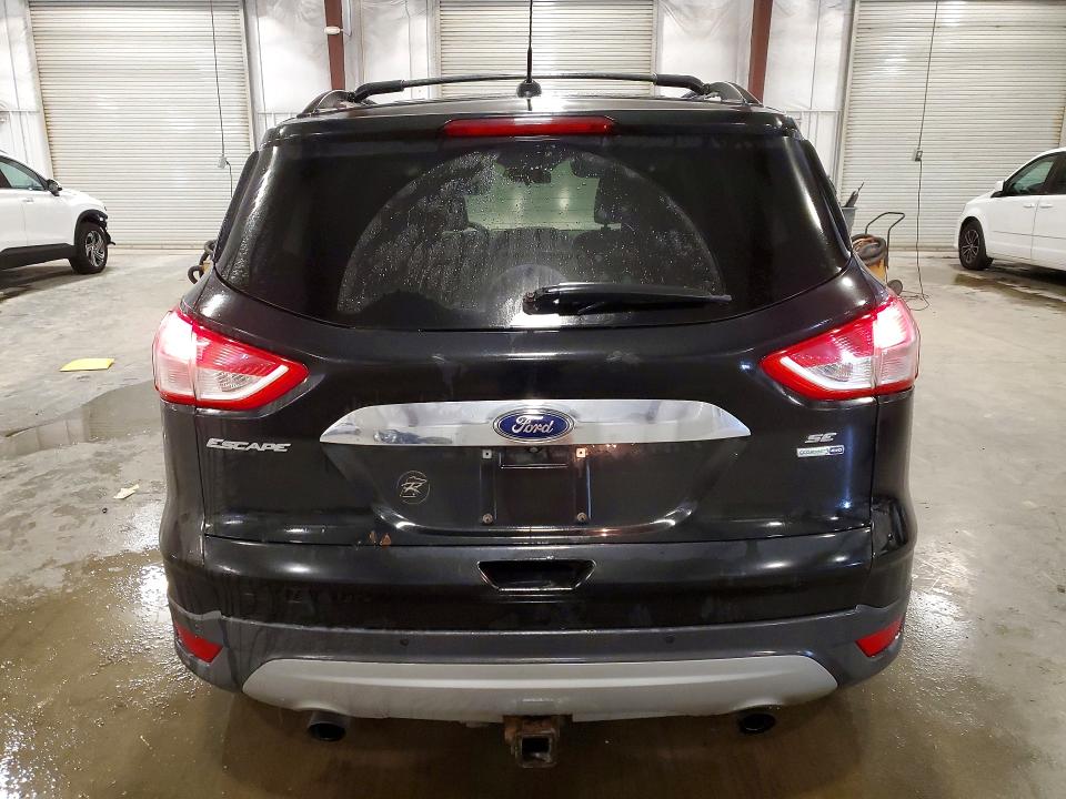Photo 6 from auction – 2014 FORD ESCAPE with VIN 1FMCU9G9XEUE52947