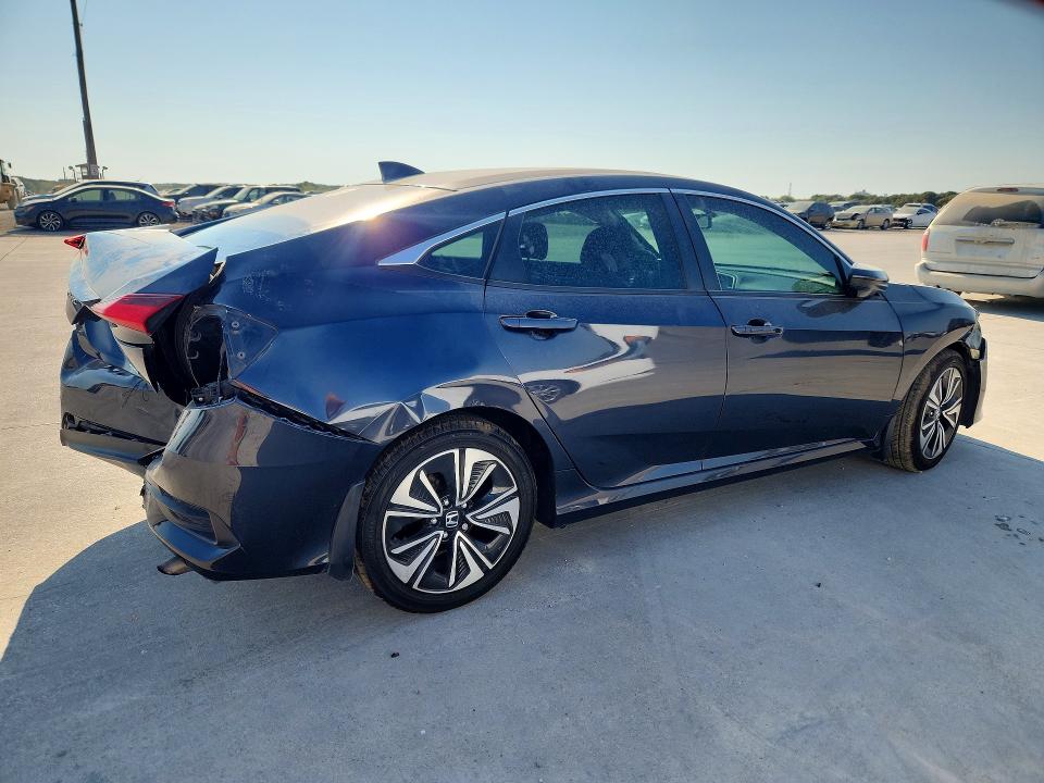 Photo 3 from auction – 2018 HONDA CIVIC with VIN 2HGFC1F74JH643087