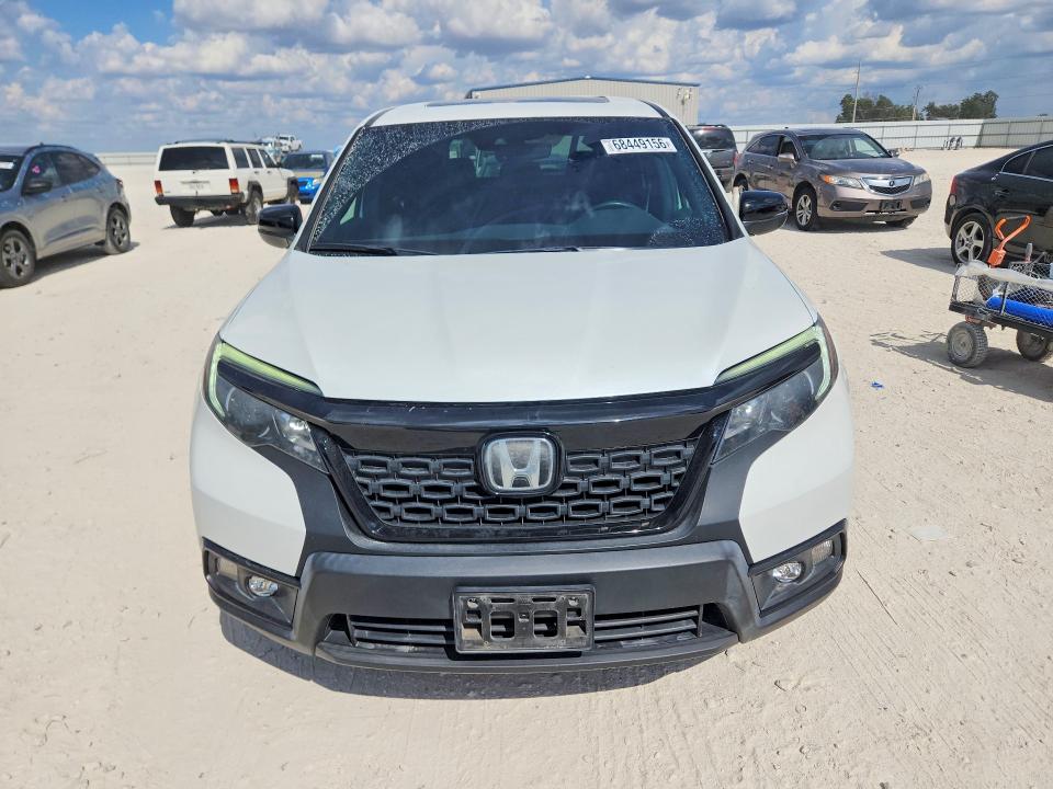 Photo 5 from auction – 2021 HONDA PASSPORT with VIN 5FNYF7H51MB015902