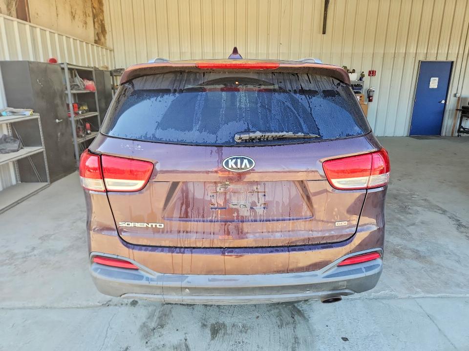 Photo 6 from auction – 2016 KIA SORENTO with VIN 5XYPG4A30GG058446