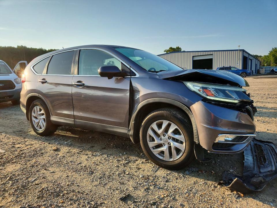 Photo 4 from auction – 2015 HONDA CR-V with VIN 2HKRM3H51FH548419