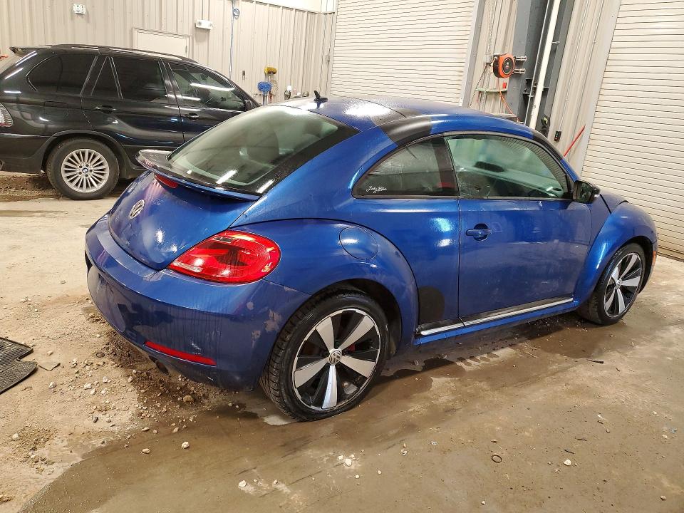 Photo 3 from auction – 2013 VOLKSWAGEN BEETLE with VIN 3VWVA7AT9DM626943