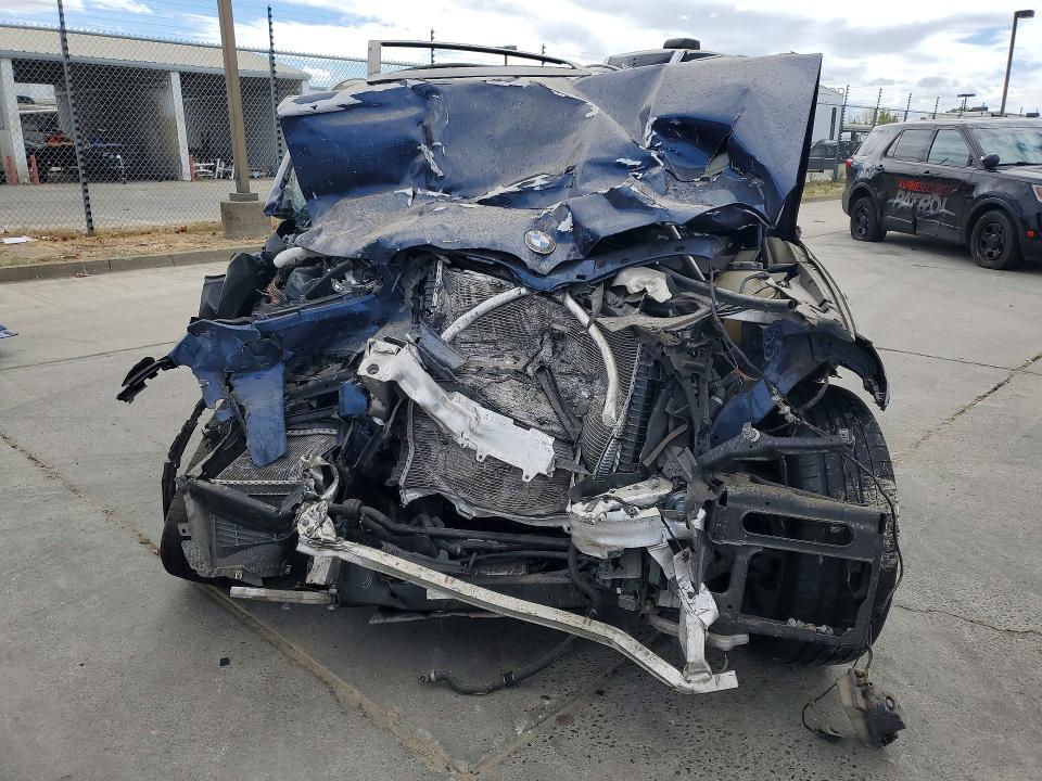 Photo 5 from auction – 2018 BMW X3 with VIN 5UXTS3C57J0Y95566