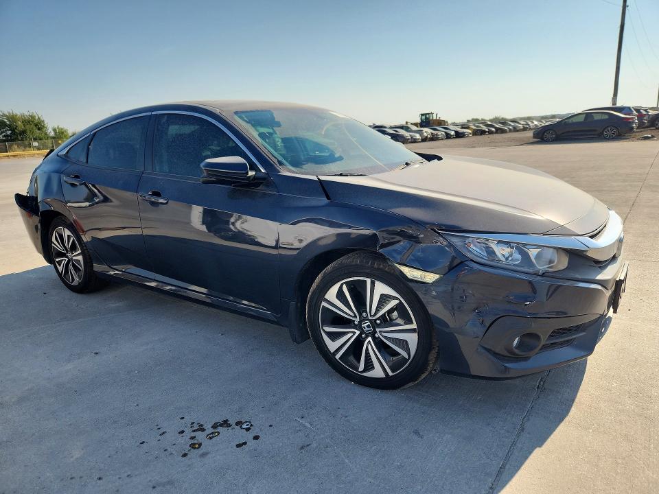 Photo 4 from auction – 2018 HONDA CIVIC with VIN 2HGFC1F74JH643087