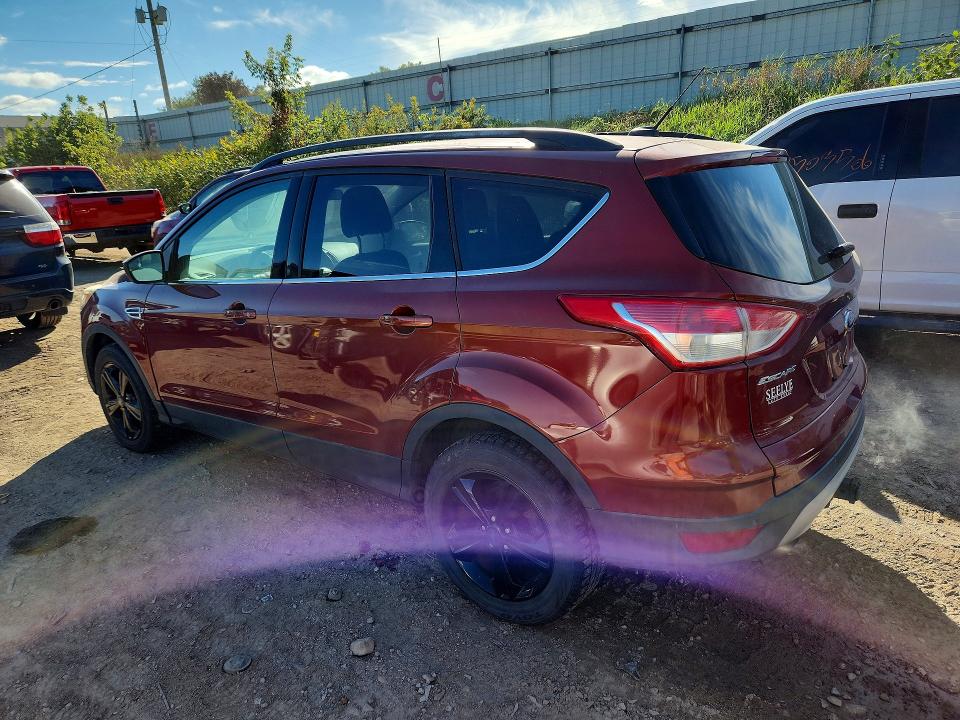 Снимка 2 от търг – 2014 FORD ESCAPE с VIN 1FMCU9G98EUC11632