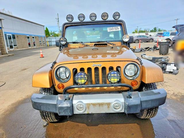 Снимка 5 от търг – 2011 JEEP WRANGLER UNLIMITED с VIN 1J4BA7H17BL603261