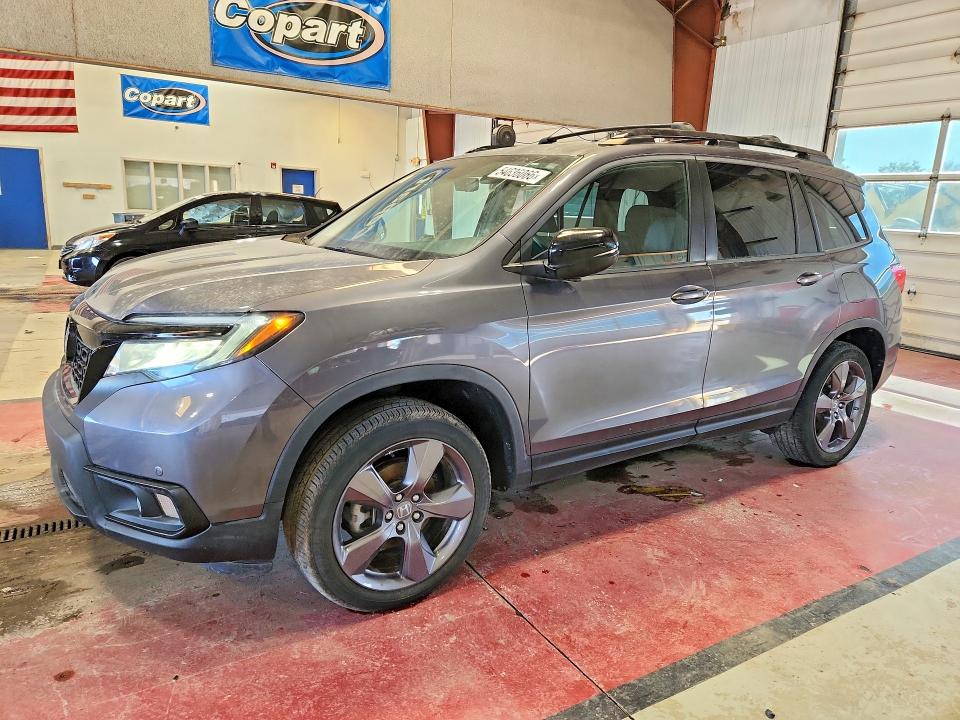 HONDA PASSPORT 2020 with VIN 5FNYF8H92LB011901 - Photo from auction