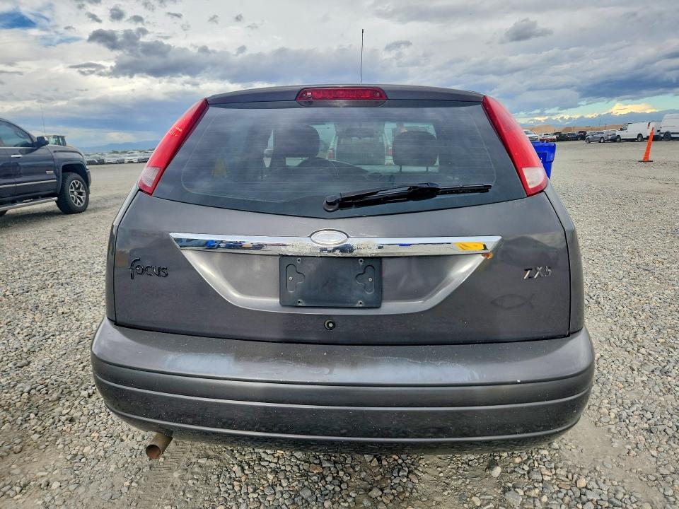 Фото 6 с аукциона – 2002 FORD FOCUS с VIN 3FAHP37382R219202