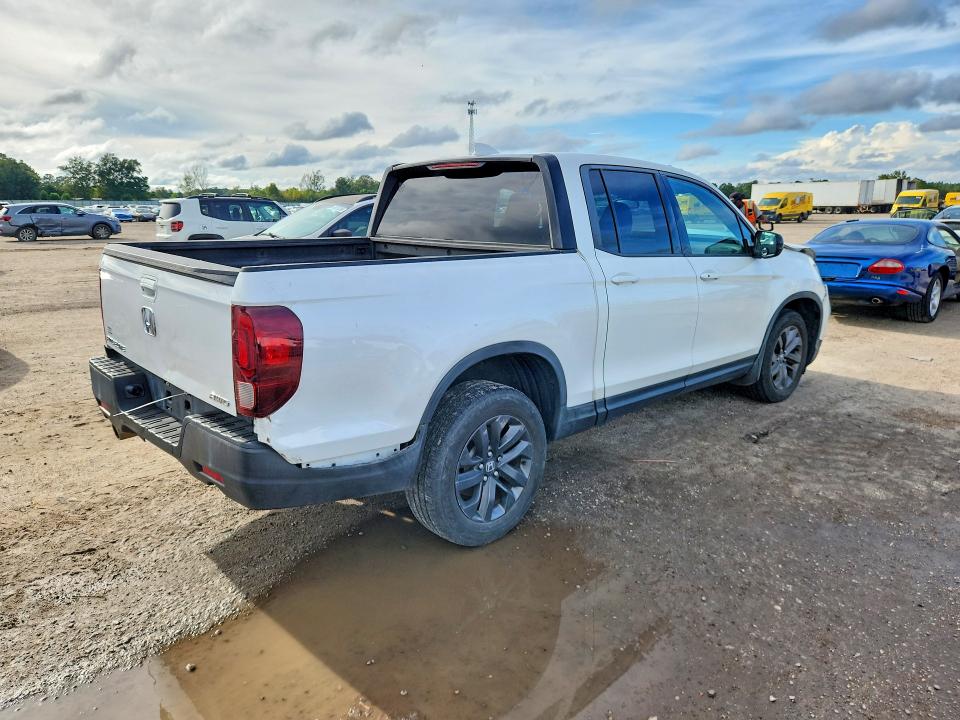Photo 3 from auction – 2021 HONDA RIDGELINE with VIN 5FPYK3F14MB014450