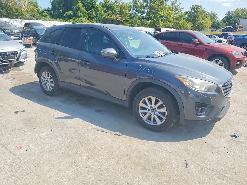 Photo 4 from auction – 2016 MAZDA CX-5 with VIN JM3KE2CYXG0620122
