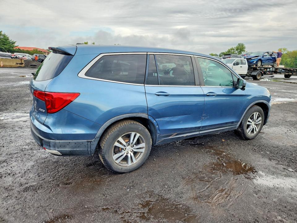 Photo 3 from auction – 2016 HONDA PILOT with VIN 5FNYF6H5XGB075966