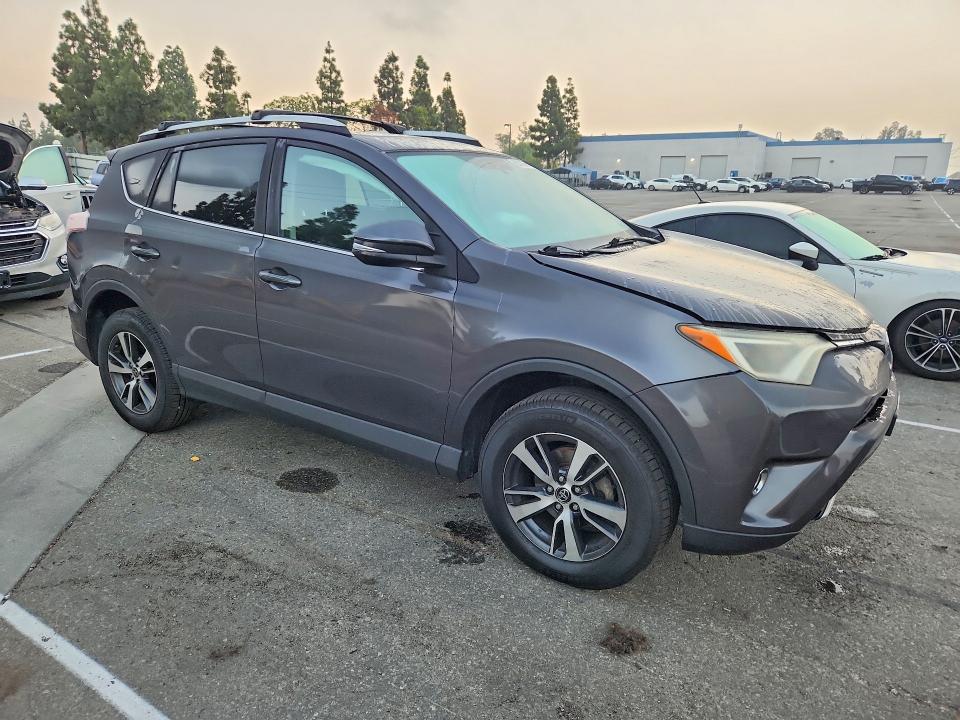 Zdjęcie 4 z aukcji – 2016 TOYOTA RAV4 z VIN 2T3WFREV2GW240674