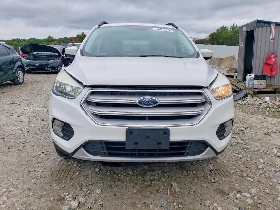 Photo 5 from auction – 2018 FORD ESCAPE with VIN 1FMCU9GD9JUA75834